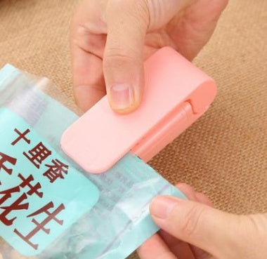 Household plastic bag sealer